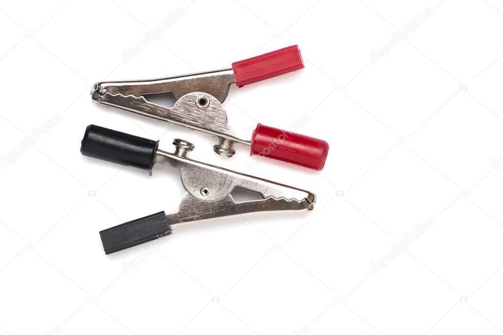 Alligator clippers on a white background