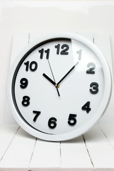 White kitchen clock with black numbers — Stock Photo, Image