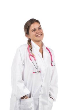 Beyaz arka planda pembe steteskoplu güzel bir doktor kadın..