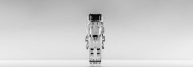 Gri arka planda izole edilmiş modern otonom robot oyuncağı.