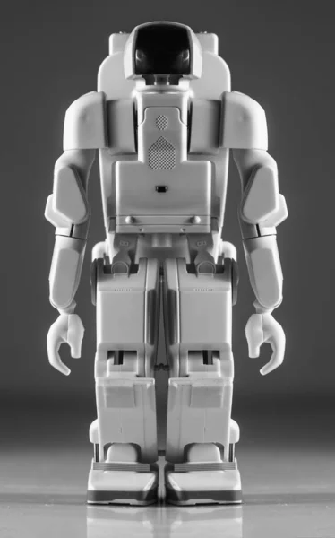 灰色の背景に隔離された現代の高度な自律型ロボットおもちゃ — ストック写真