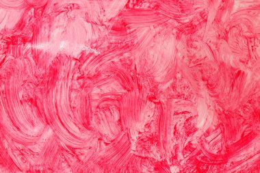 Boyalı kırmızı kağıdın ayrıntılarını soyut bir şekilde fırçayla kapat