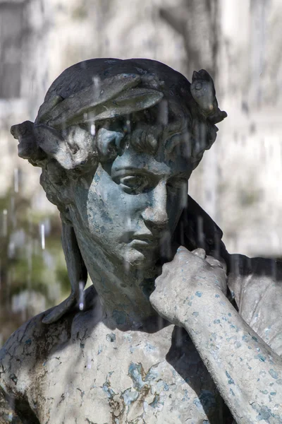 Statues of the fountain in the Rossio square — Stock Photo, Image