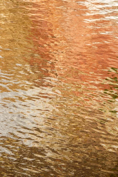 Texture of golden water. — Stock Photo, Image