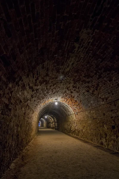 Dark eerie mining tunnel — Stock Photo, Image