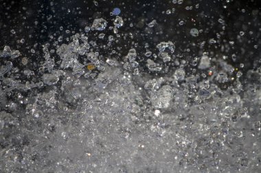 burst of many tiny water droplets.