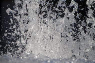 burst of many tiny water droplets.