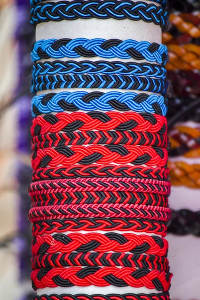 Many various leather and textile bracelets — Stock Photo, Image