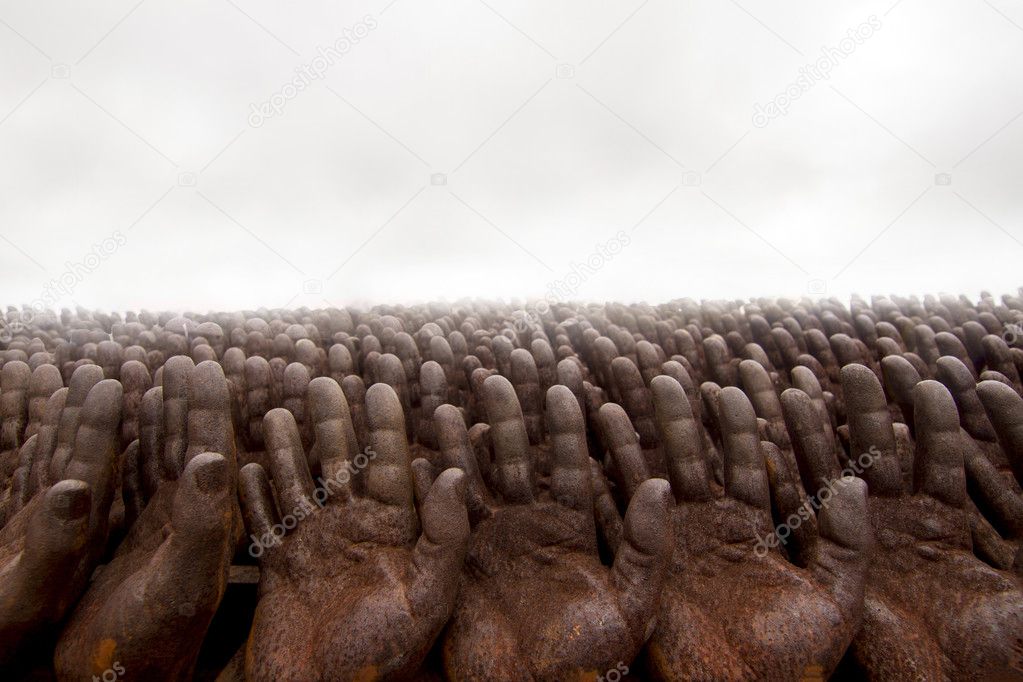 piece of art depicting hundreds of hands.