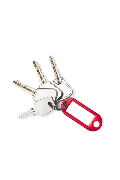 Set of keys with a red tag — Stock Photo, Image