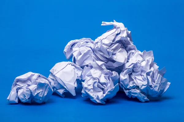 Pile of wrinkled white pieces of paper — Stock Photo, Image