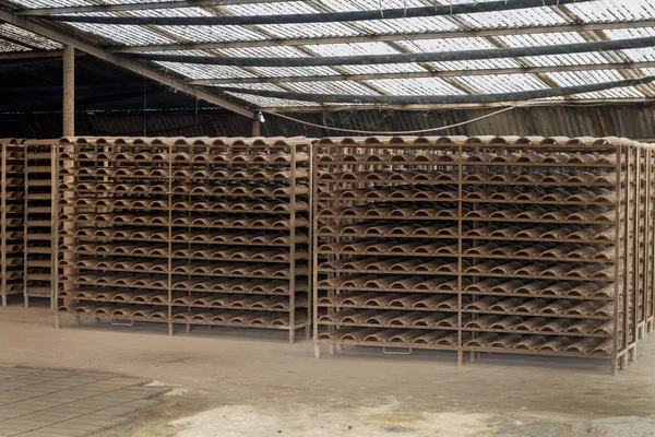 Pile of traditional mud roof tile production — Stock Photo, Image