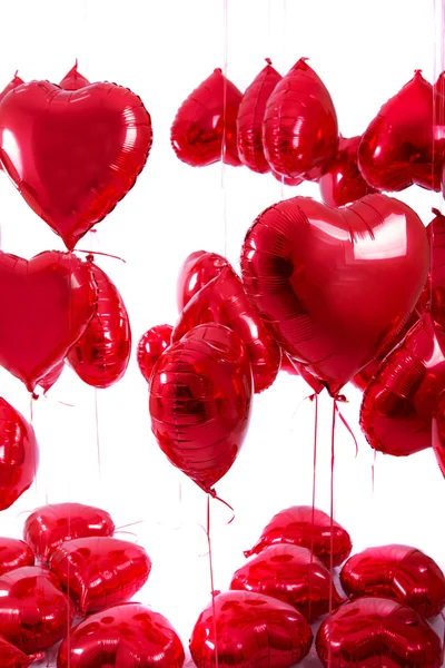 Un mucchio di palloncini di cuore rosso — Foto Stock