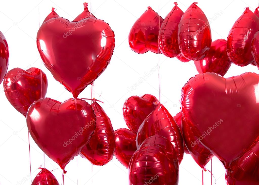 bunch of red heart balloons
