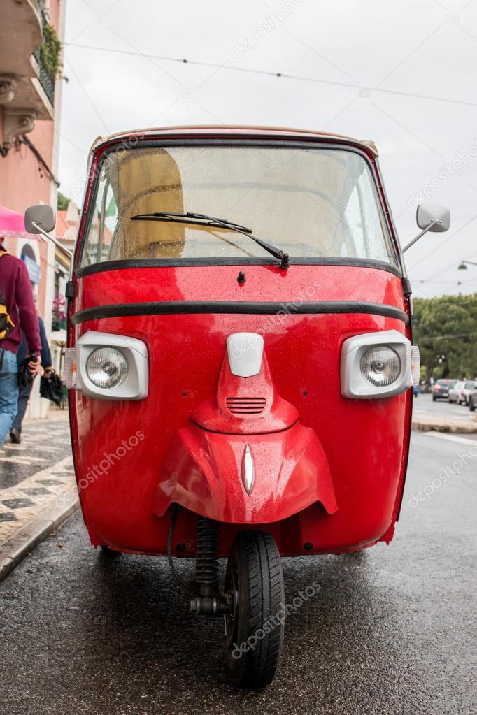red vintage auto rickshaw motorcycle