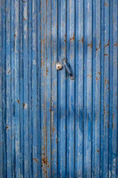 old blue metal door