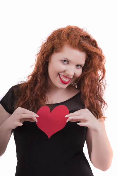 Menina feliz com um coração vermelho — Fotografia de Stock