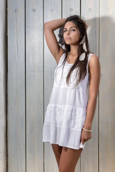 Beautiful woman on a white dress — Stock Photo, Image