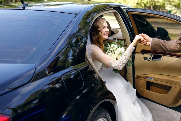 Groom Helps Happy Young Bride Get Out Wedding Car Elegant — Stock Photo, Image
