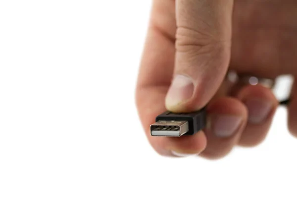 Cable USB en la mano — Foto de Stock