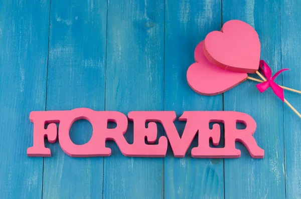 Pink wooden forever inscription — Stock Photo, Image