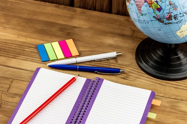 Notebook with pens and colorful stickers — Stock Photo, Image