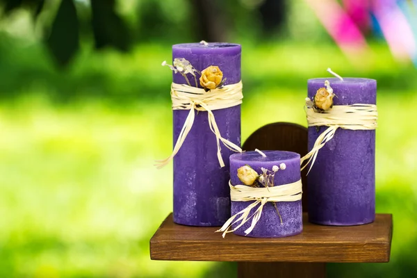 Handmade purple wedding candles — Stock Photo, Image