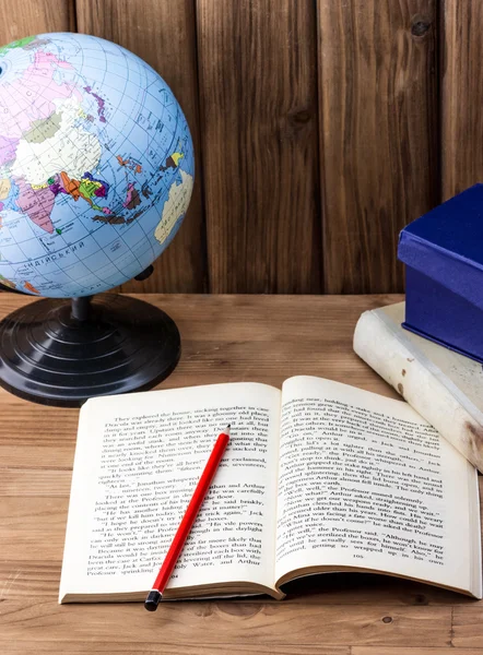 Open book, red pencil and globe — Stock Photo, Image