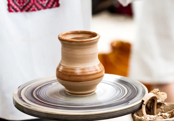 Ready clay pot on pottery wheel — Stock Photo, Image