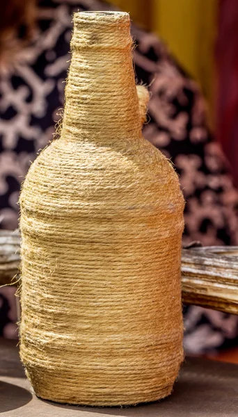 Handmade twine bottle — Stock Photo, Image