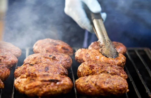 Chef checking meat — Stock Photo, Image