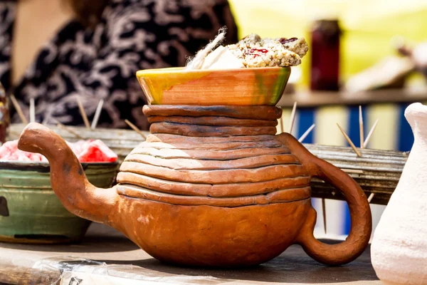 Clay teapot on wooden counter — Stock Photo, Image