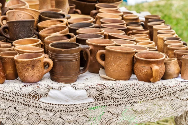 Heap of different clay cups — Stock Photo, Image