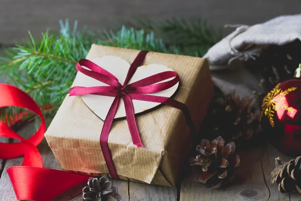 Christmas gift box decorated with bow — Stock Photo, Image