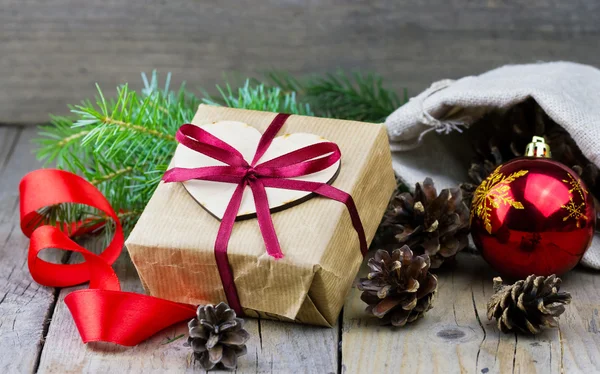 Christmas gift box decorated red bow — Stock Photo, Image