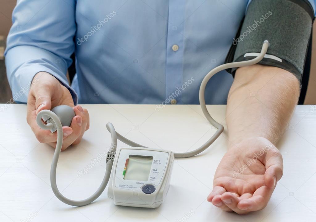 Doctor  measuring blood pressure