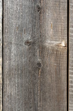 Yıpranmış eski bir tahta parçasının kabartmalı dokusu. Soyut arkaplan