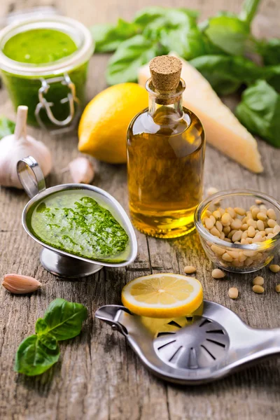 Composition with ingredients for sauce pesto preparing on rough — Stock Photo, Image
