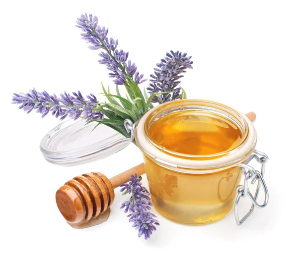 Jar of liquid honey with lavender — Stock Photo, Image