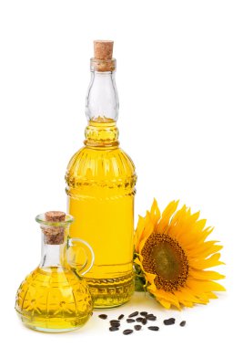 Ayçiçek yağı ve üzerinde beyaz izole tohum