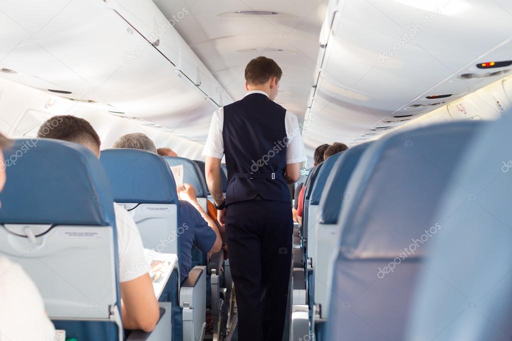 Steward on the airplane.