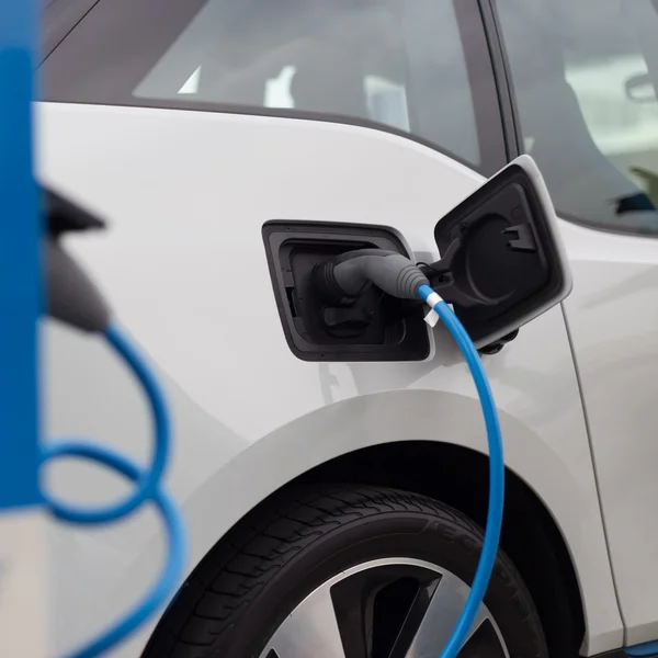 Electric Car in Charging Station. — Stock Photo, Image