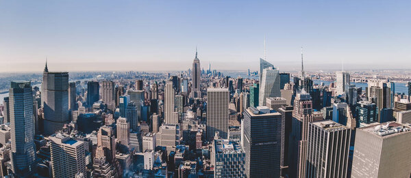 Panoramic view of New York City. Manhattan downtown skyline with Empire State Building and skyscrapers.