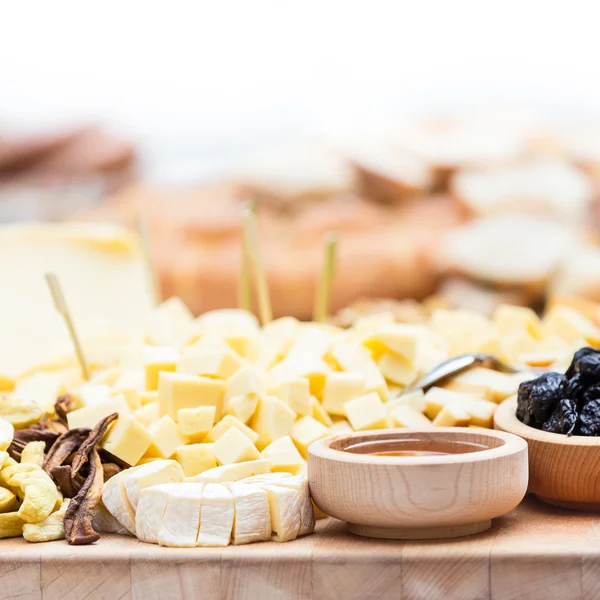 Cheese Plate with Dried Fruit and Honey — Stock Photo, Image
