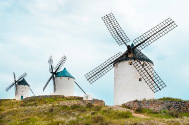 Vintage windmills in La Mancha. clipart