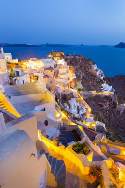Santorini üzerinde Oia köyde günbatımı, Yunanistan.