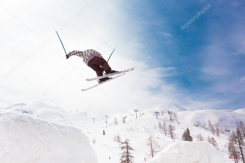 Free style skier performing a high jump