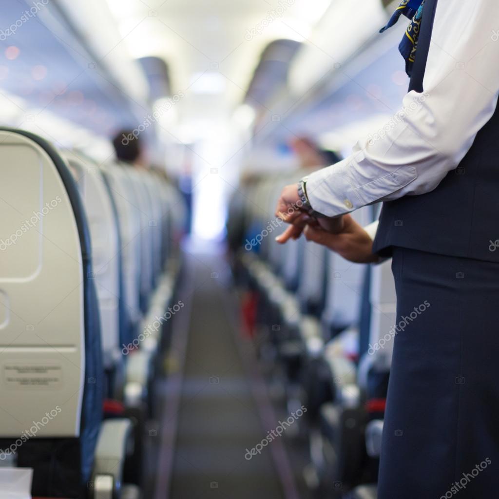 Stewardess on the airplane.