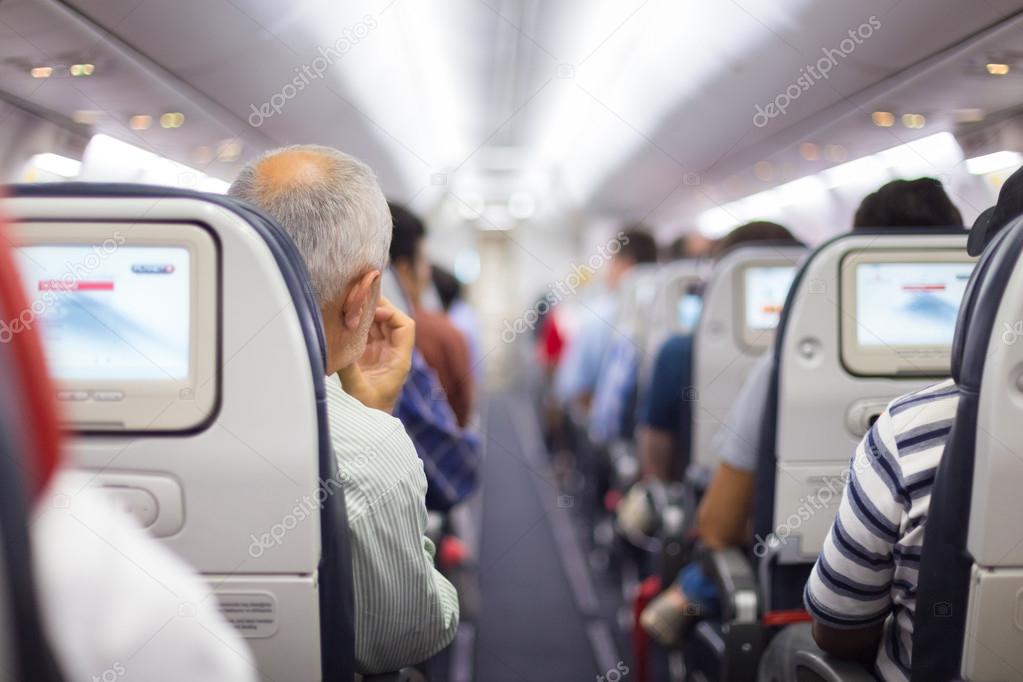 Passengers on the airplane.