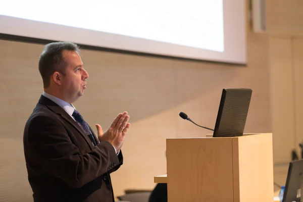 Speaker giving talk on podium at Business Conference. — Stock Photo, Image